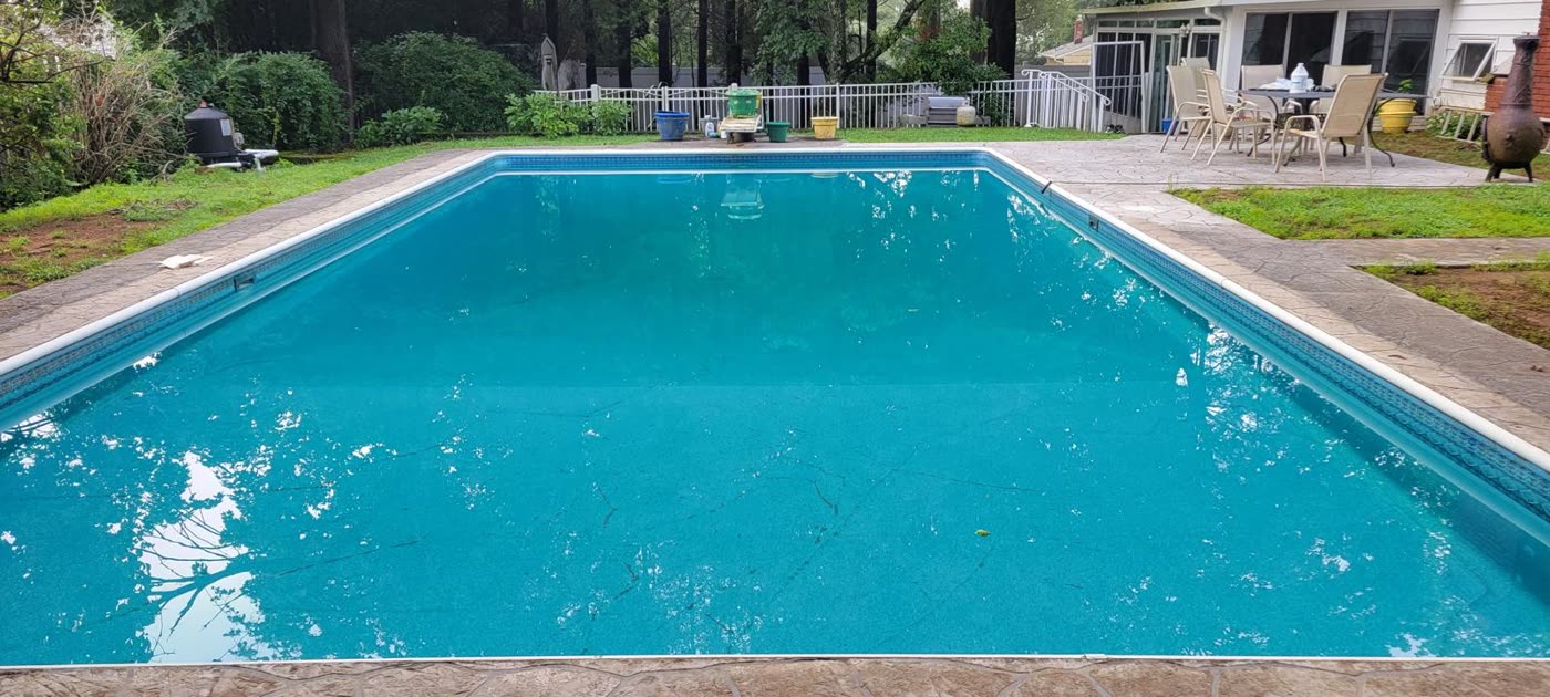 The same pool, crystal clear and swim-ready after service